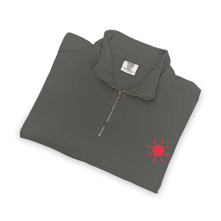 Folded gray pullover with a red sun logo - RC city