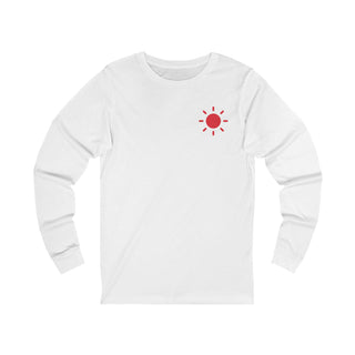White long-sleeve shirt with a red sun graphic 