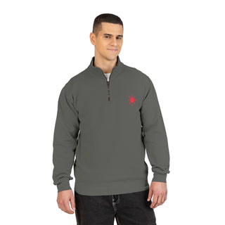 Man wearing a gray pullover with a red logo- RC city