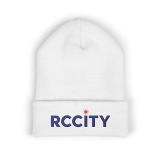 White beanie with 'RCCITY' logo on a white background