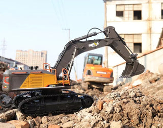 Lightweight RC excavator digging sand and dirt