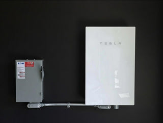 Tesla Inverter installed on black wall